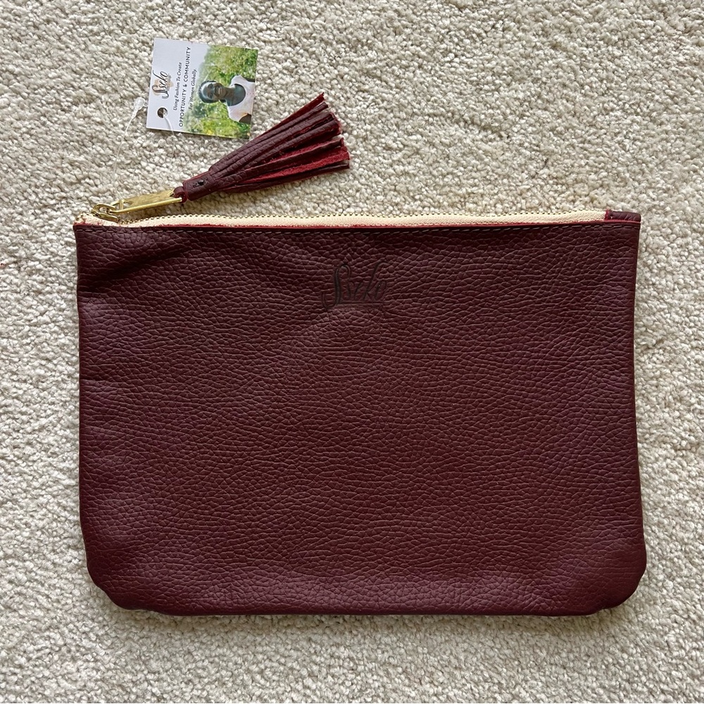 NWT Sseko Tassel Clutch  in Syrah